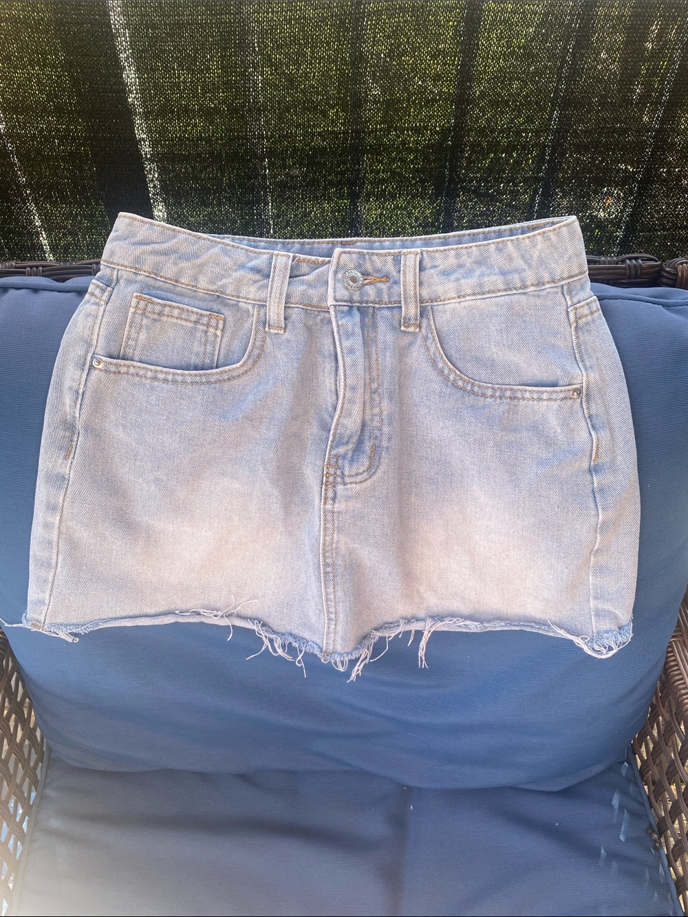 Light Wash Denim Mini Skirt with Raw Hem